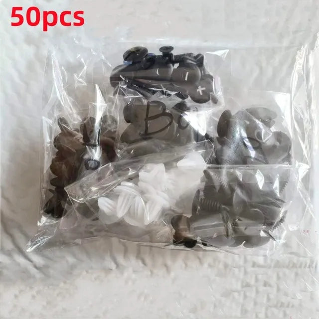A clear plastic bag containing a set of universal auto trim panel retainer clips and related hardware.