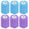 A set of wall-mounted disposable toilet brush heads in light blue and purple.