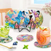 A set of eight ocean-themed diamond art coasters and a holder with various colorful designs displayed on a white surface.