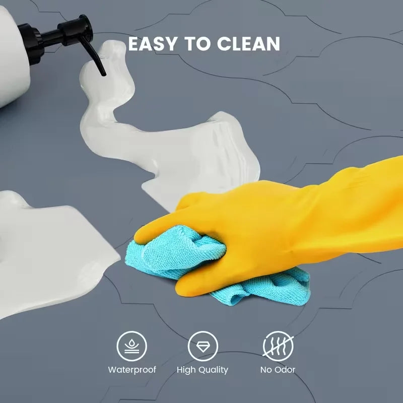 A yellow glove is shown cleaning a white silicone sink protector mat, highlighting its waterproof, high quality, and no odor 