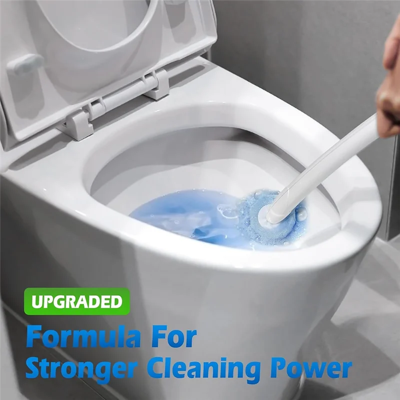 A hand is using a white toilet wand to dispense blue cleaning liquid into a toilet bowl.