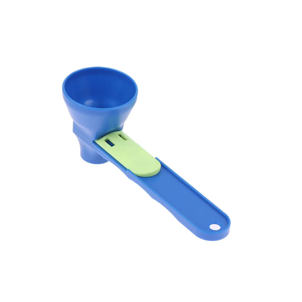 A blue sliding coffee scoop and funnel with a light green plastic handle.