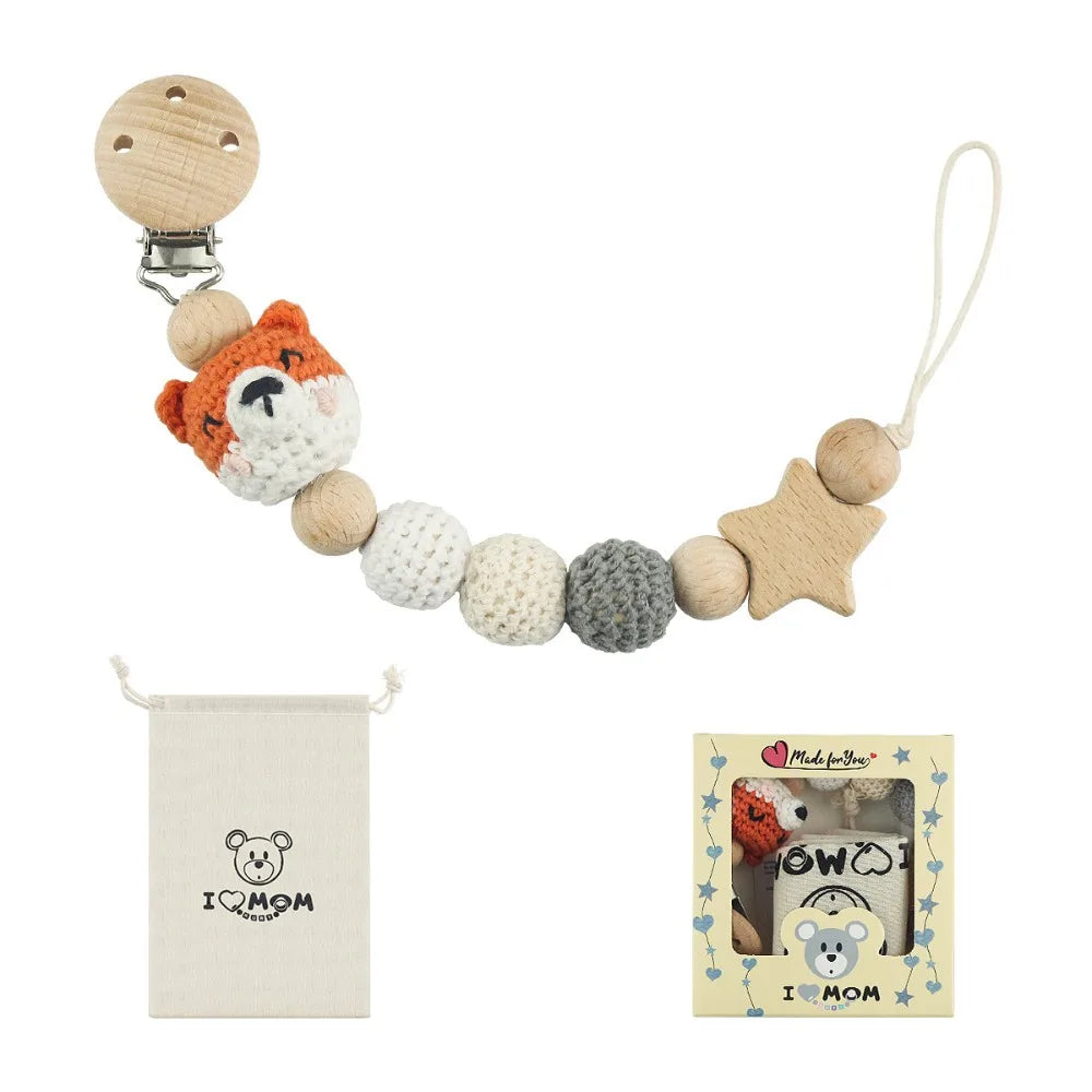 A wooden pacifier clip chain featuring a star shape and various crochet beads for baby teething.
