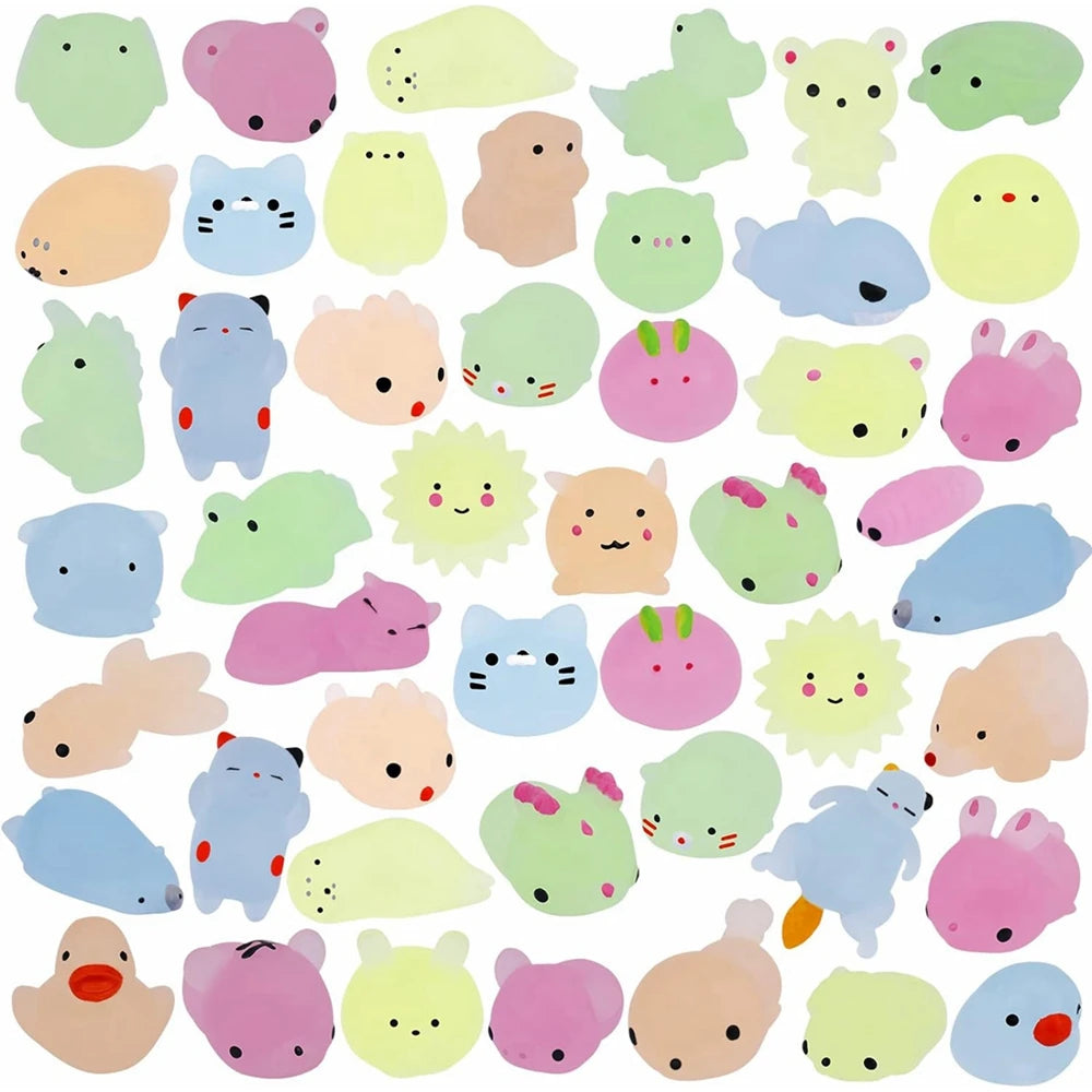 A collection of colorful kawaii animal squishies in various pastel shades and shapes.