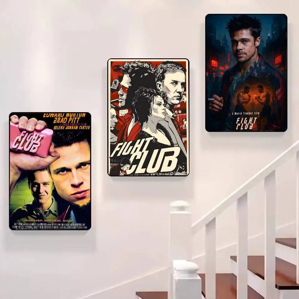 A collection of Fight Club movie posters displayed on a white wall next to a staircase.