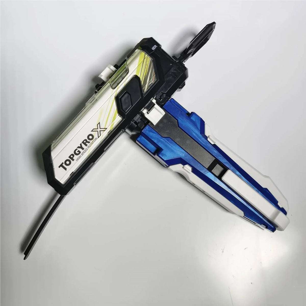 A black and white Beyblade Burst Gyro Launcher accessory for kids.