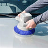 A person is using a gray car polishing pad set with blue microfiber and wool bonnets on a silver car surface.