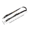 A black camouflage adjustable crossbody bag strap with a hanging ring.