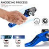 A hand holds a blue anodized aluminum brake and clutch lever set, demonstrating comfortable hand feeling and wear resistance.