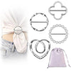 A set of silver metal scarf ring clips and a lavender fabric pouch for fashion accessories