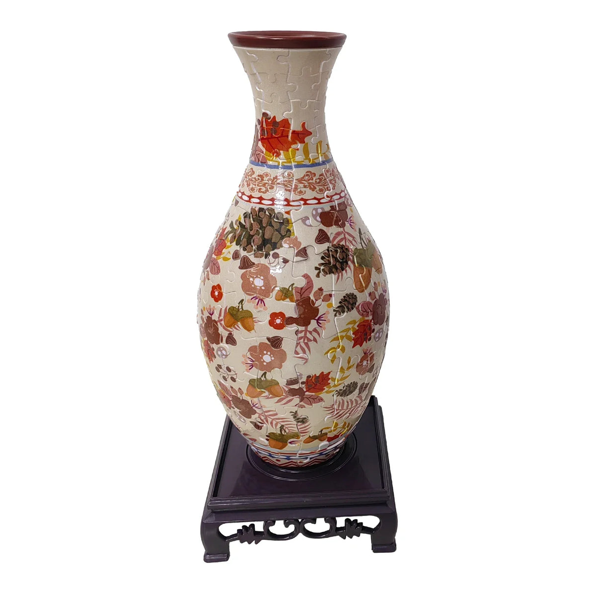A ceramic vase with floral patterns and a reddish-brown rim displayed on a dark stand.