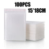 A stack of 100 white padded bubble mailers, measuring 15x18cm each.