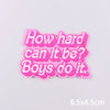 Pink embroidered iron-on letter and word patches spelling out How hard can it be Boys do it.