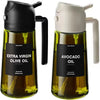 A dark green glass bottle of extra virgin olive oil with a black dispenser top and a white sprayer top.