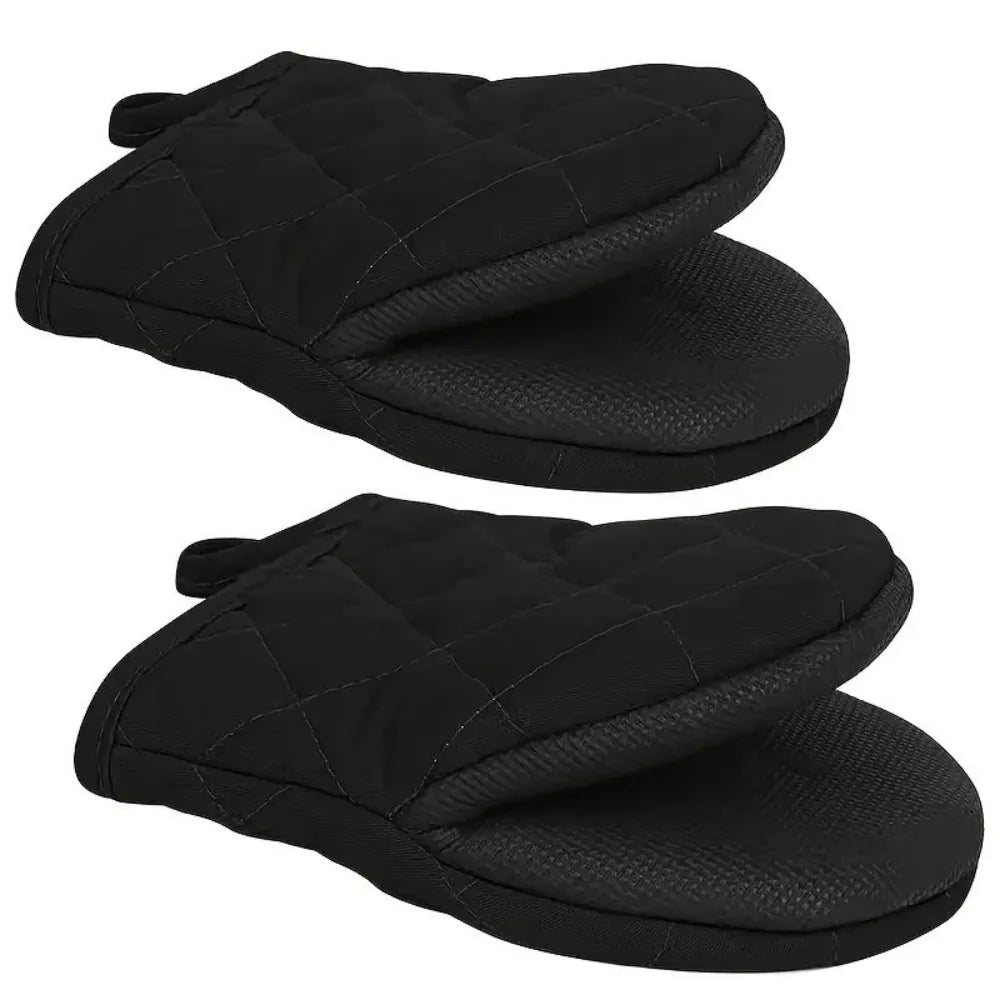 A pair of black heat-resistant silicone oven mitts with a non-slip grip.