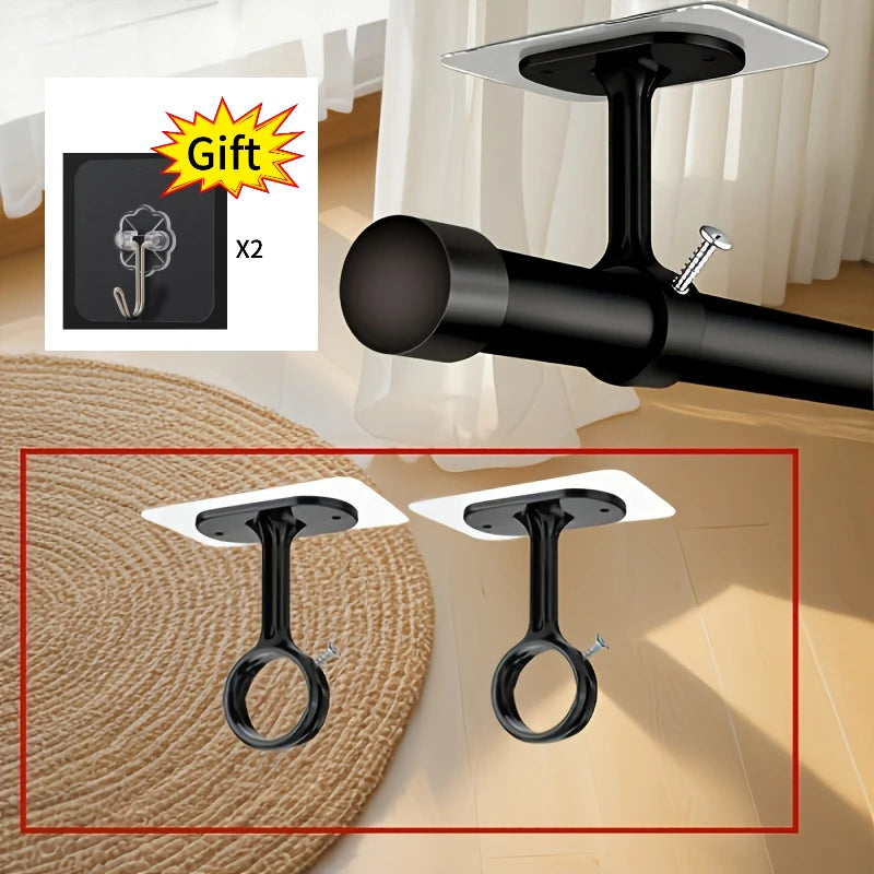 Two black self-adhesive ceiling curtain rod brackets are shown against a white background.