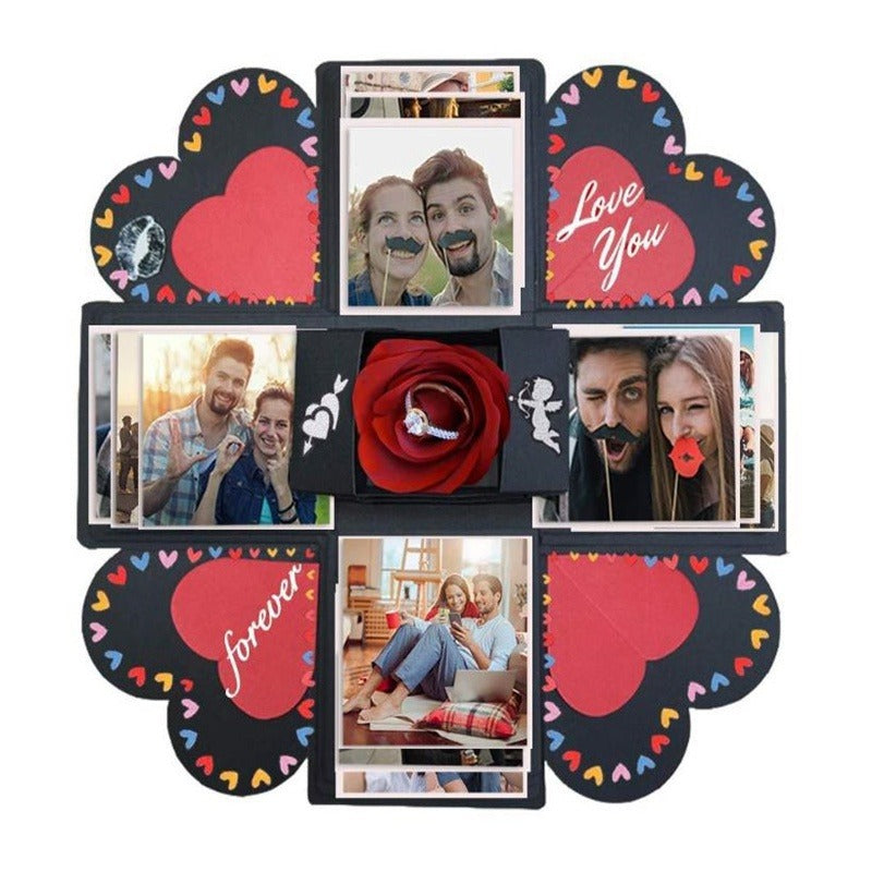A DIY explosion photo gift box featuring various couple photos arranged in heart-shaped compartments.