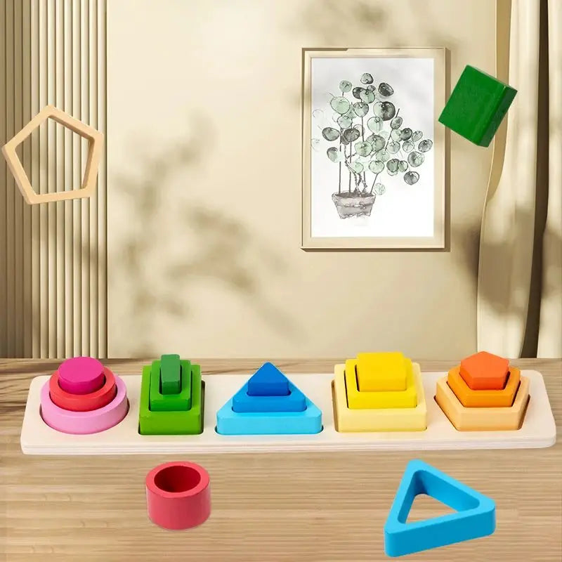 A wooden sorting and stacking toy set with various colored blocks and a green leaf print artwork displayed on a shelf.