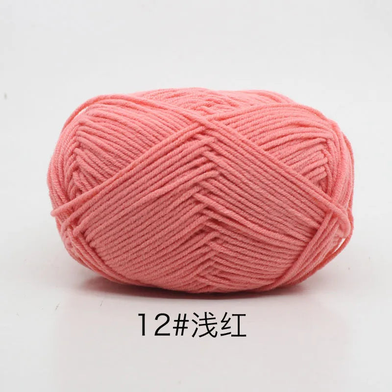 A ball of soft pink 12# yarn used for knitting and crochet