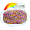 A ball of multi-colored milk cotton blend yarn with a rainbow background.