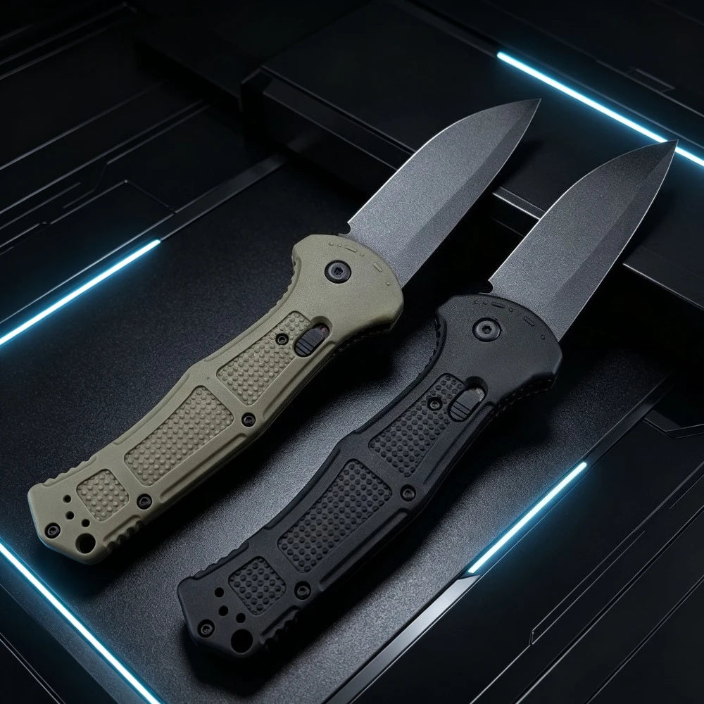 A folding pocket knife with a gray blade and a light tan anti-slip handle resting on a dark surface.