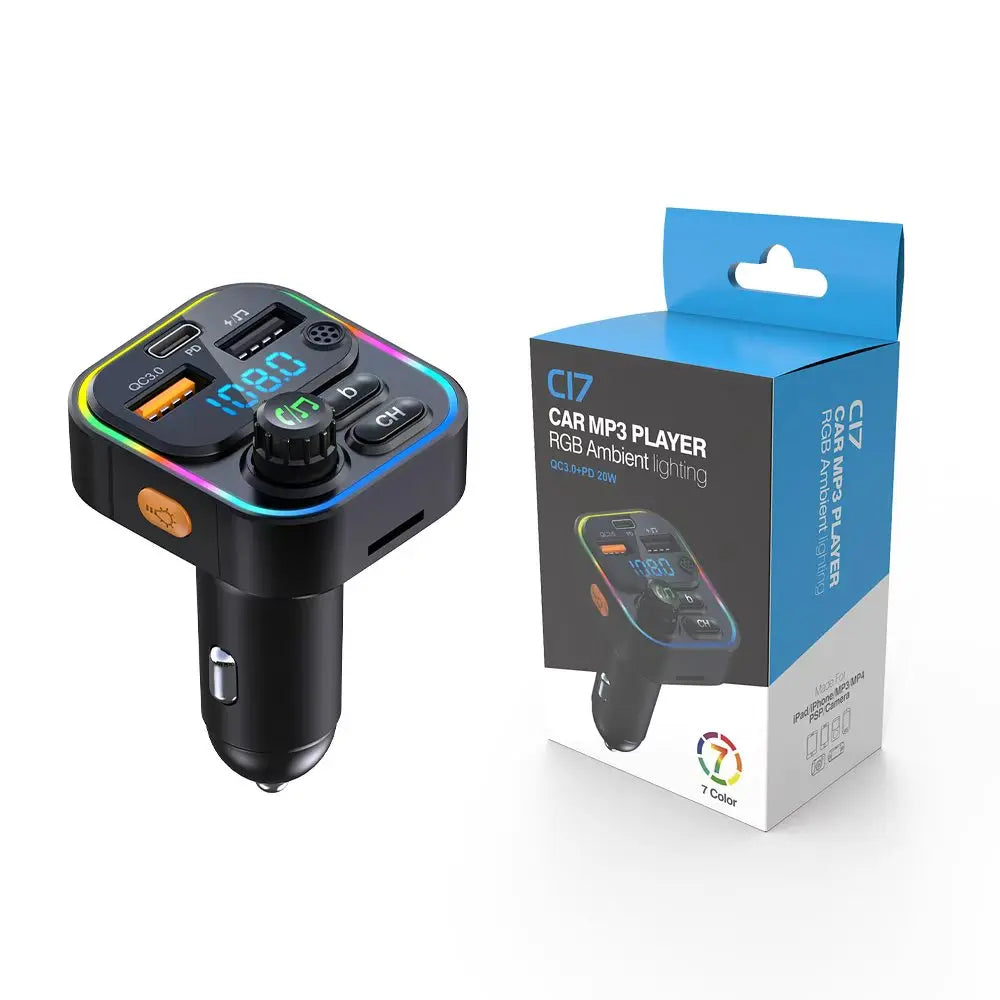 A black car audio device with an orange and green display and controls is shown next to its blue packaging box.