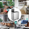 A modern stainless steel dual compartment recycling trash can with a soft-close lid.