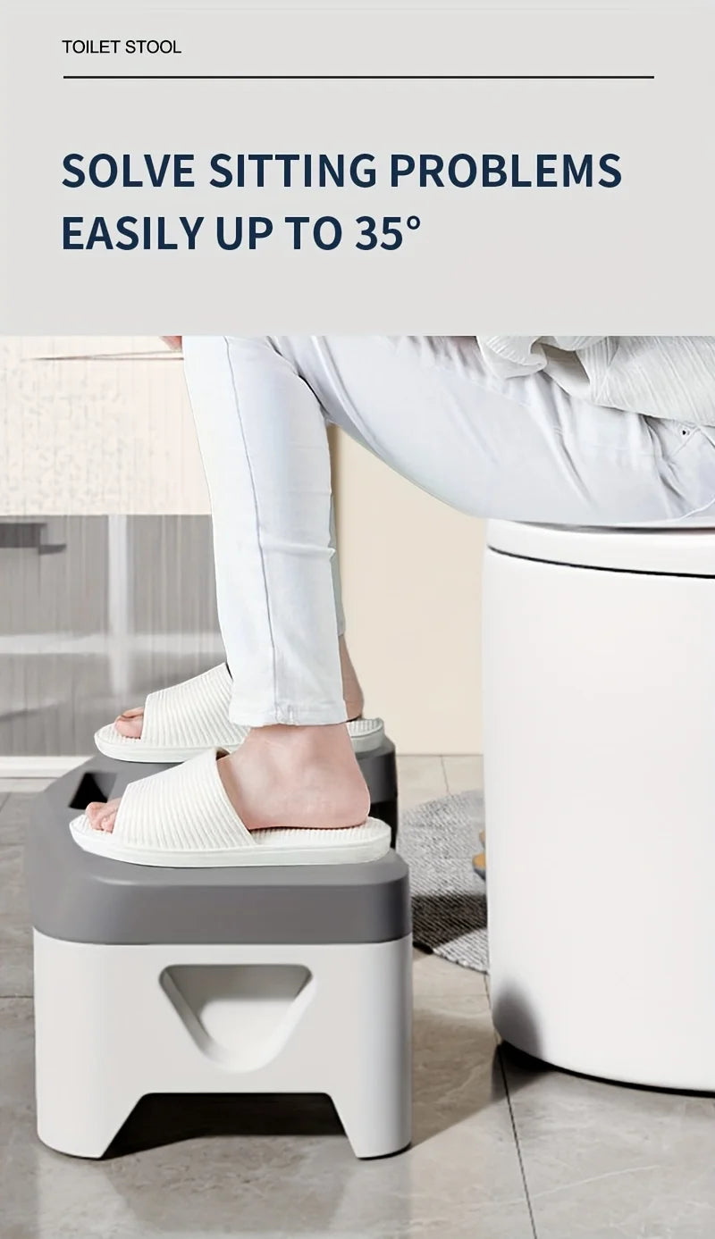 A person is using a white comfort squatting stool to solve sitting problems in a bathroom setting.