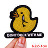 A yellow cartoon duck embroidered patch with a black outline and the text DON'T DUCK WITH ME