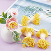 A collection of 400 pearl flower stamens in shades of pink and yellow for DIY crafts and wedding decor.