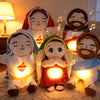 A set of comforting Jesus plush toys with breathing motion features a baby, a child, and an adult figure.