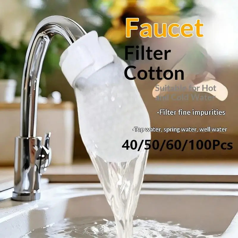A close-up of a faucet filter cotton bag dripping water into a sink.
