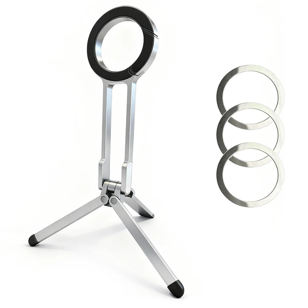 Silver magnetic phone tripod with a circular clip and adjustable legs.