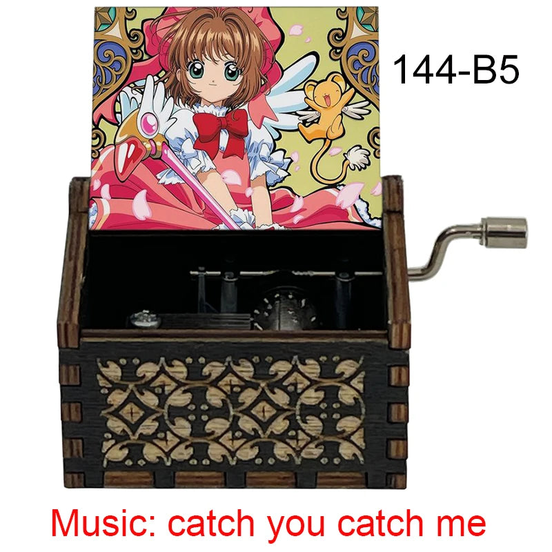A wooden music box featuring a Cardcaptor Sakura character, with the title Catch You Catch Me visible.