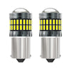 A pair of LED turn signal and reverse light bulbs with silver housing and yellow light elements.
