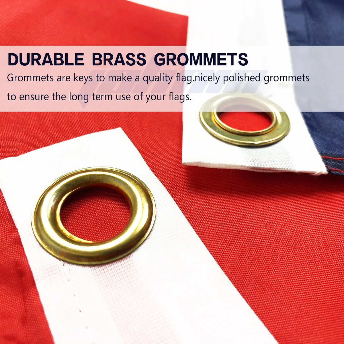 Close-up of a brass grommet used to attach a flag, shown on red and white fabric.