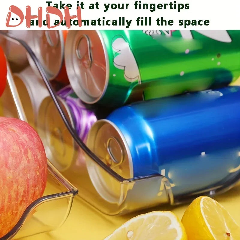 Stackable refrigerator storage bins with a citrus slice and apple visible in the background.