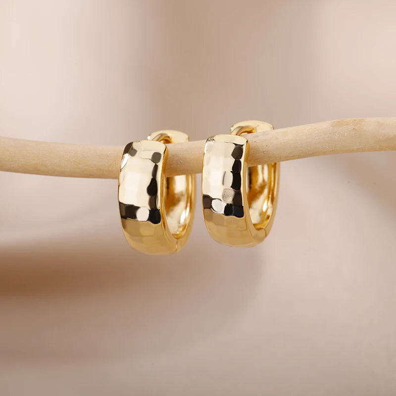 Boucles d'oreilles créoles en zircon cubique ton or