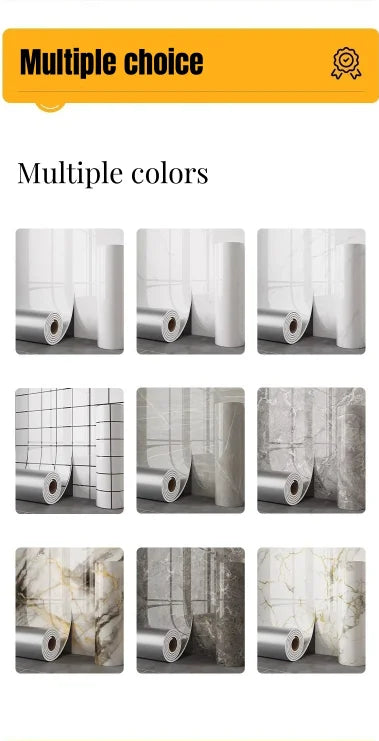 Multiple rolls of self-adhesive marble wallpaper showing various textures and finishes.