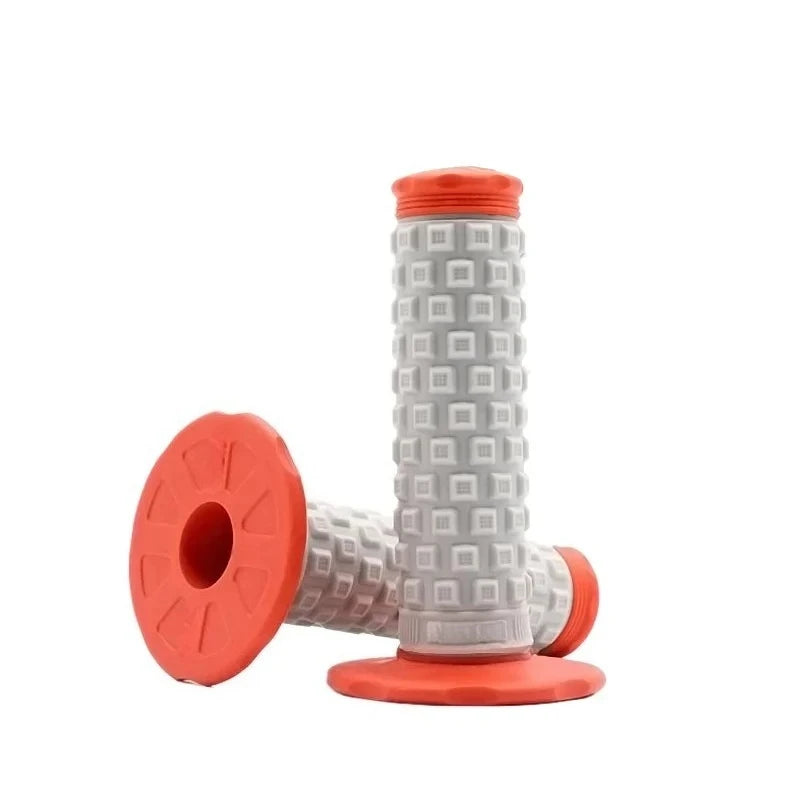 Orange and white motorcycle handlebar grips with textured foam covers
