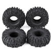 A pair of black mud terrain wheels and tires for RC crawlers.