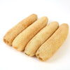 A bundle of natural loofah body scrubbers with hanging ropes.