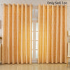 A pair of sheer gold curtains with a feather jacquard pattern hanging in a window.