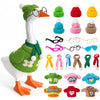 A white goose statue wearing a knitted green sweater and matching hat, with various knitted accessories displayed below.
