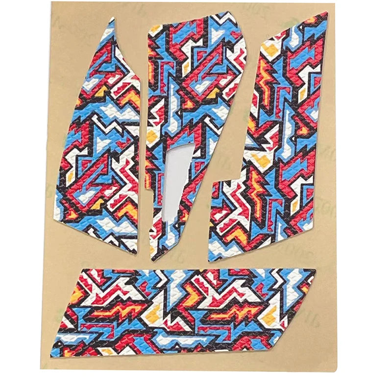 A set of anti-slip mouse grip tape featuring geometric patterns in blue, red, black, and white on a beige background.