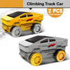 Two yellow and gray climbing track cars are shown, ready for use.