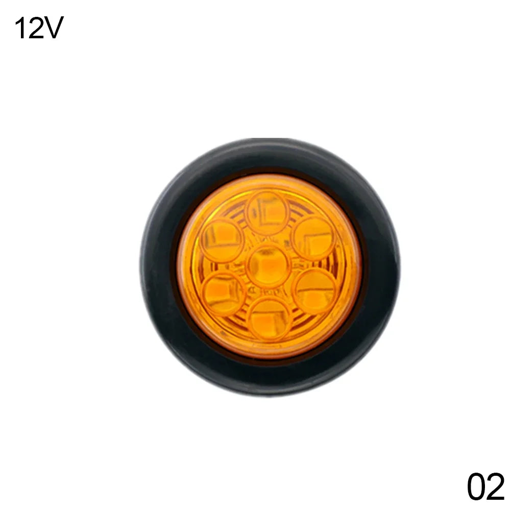 A round amber LED tail light assembly for a 12V vehicle.