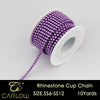 A spool of purple rhinestone cup chain with a white plastic core and a thin tail, labeled as SIZE.SS6-SS12, 10 yards.