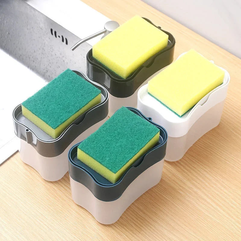 A set of three press-type portable soap dispensers with yellow and green sponges on a wooden surface.
