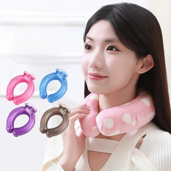 A woman holds various colored U-shaped reusable neck wraps, including pink, blue, purple, and gray, against her neck.
